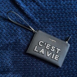 Karl Lagerfeld Black Wristlet with Silver Text “C’EST LA VIE”